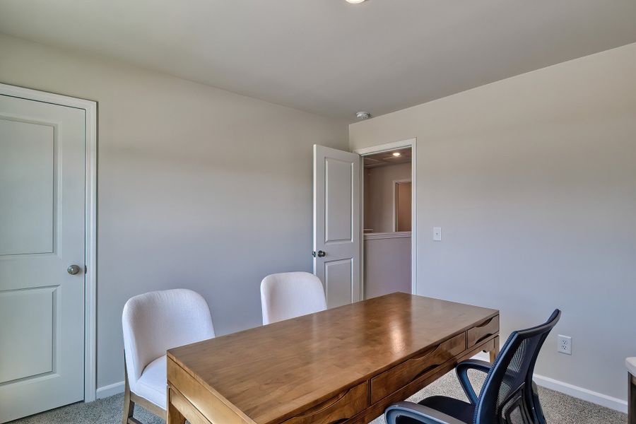 Representative furnished interior of a home built from the Poplar A by McGuinn Homes in Rivers Crossing, Aiken (Image 17).