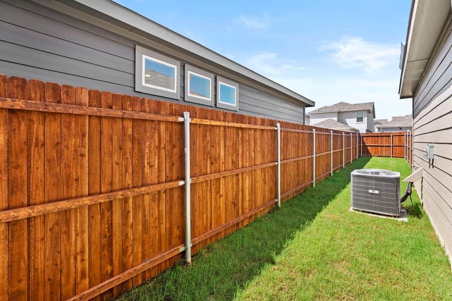 Exterior details and patio area of a home in Orchard Village, Fort Worth (Image 2).