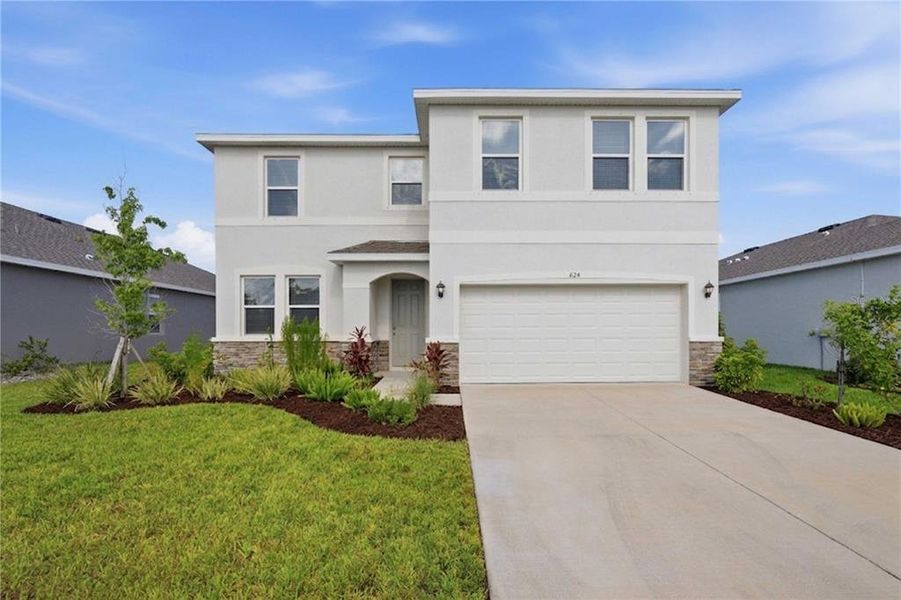 Front exterior of a new home in Coddington, Bradenton, FL, highlighting curb appeal (Image 2).