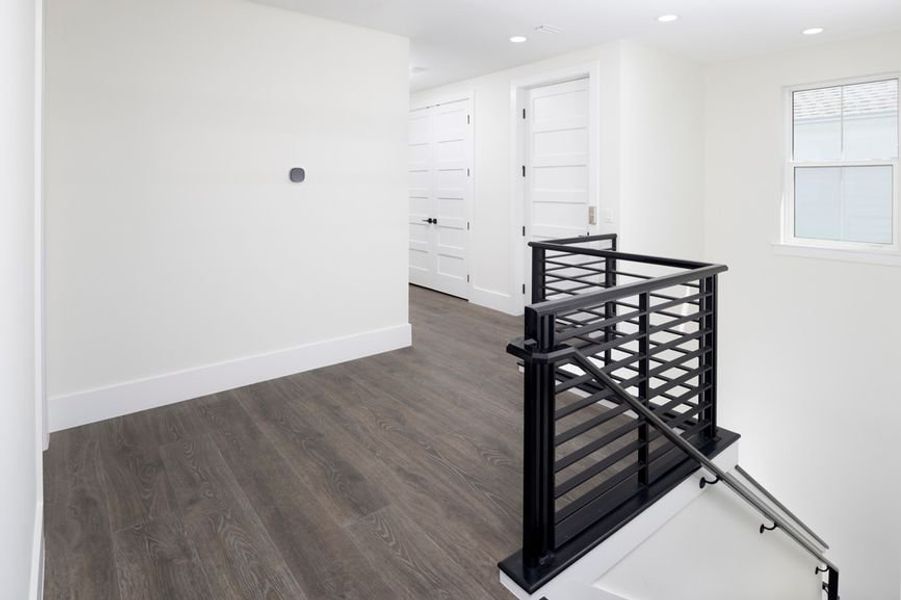 Representative unfurnished interior of a home built from the Grand Spinnaker by Minto Communities in Latitude Margaritaville Watersound, Panama City Beach (Image 19).