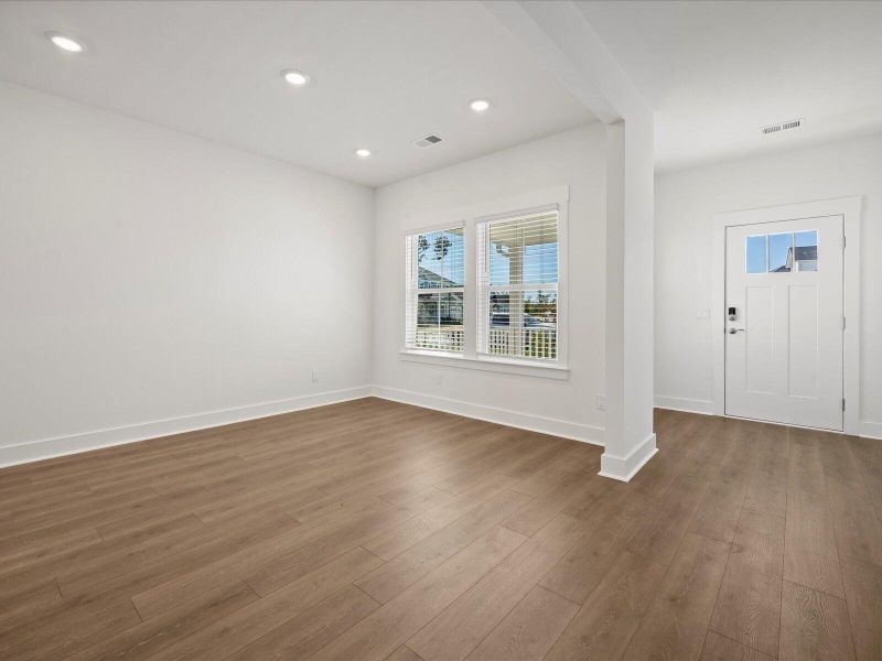 Spacious, unfurnished interior of a new home in The Coves at Lakes of Cane Bay, Summerville (Image 21).