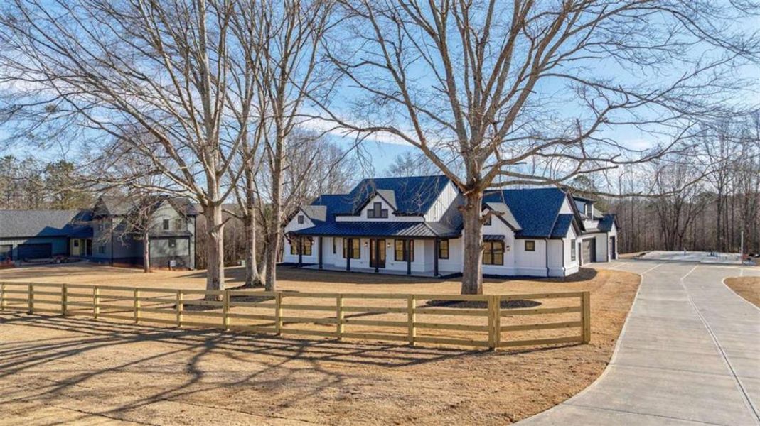 Front exterior of a new home in , Monroe, GA, highlighting curb appeal (Image 29).
