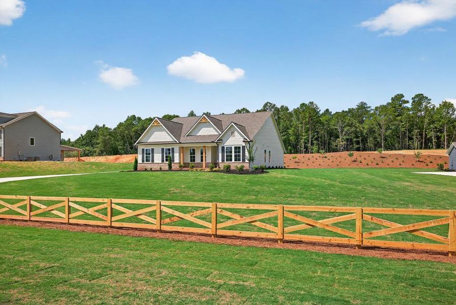 Front exterior of a new home in Pinegate, Covington, GA, highlighting curb appeal (Image 29).