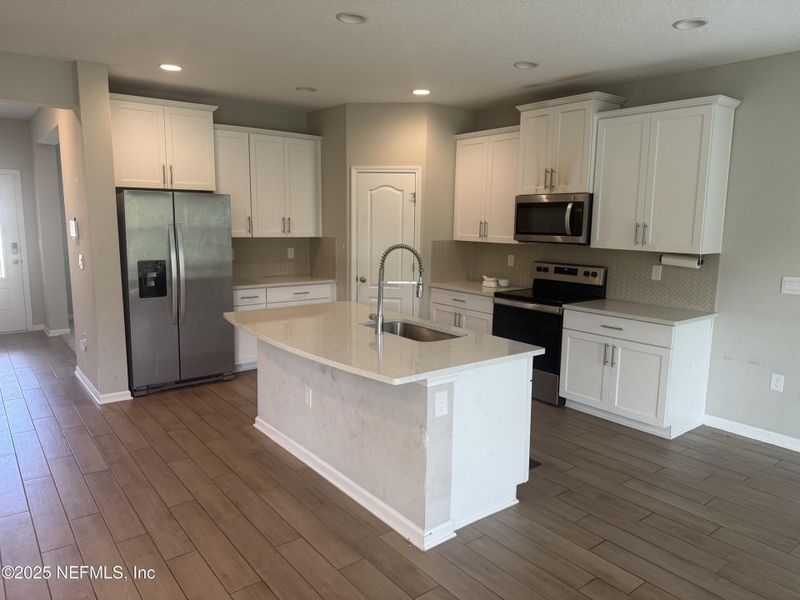 Furnished interior view inside a new home in River Glen, Yulee (Image 3).
