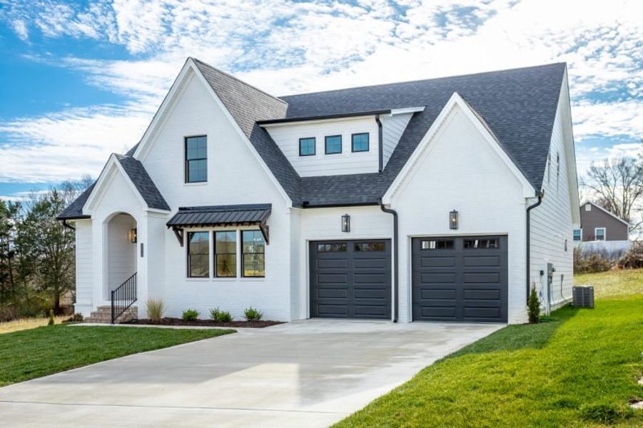 Representative exterior photo of a completed home built from the Carolina A by Riverstone Construction, LLC in Faith View, Ooltewah, TN (Image 16). Representative exterior photo of a completed home built from the Carolina A by Riverstone Construction, LLC in Faith View, Ooltewah, TN (Image 16).