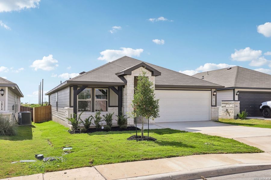 Front exterior of a new home in Catalina, Converse, TX, highlighting curb appeal (Image 23). Front exterior of a new home in Catalina, Converse, TX, highlighting curb appeal (Image 23).