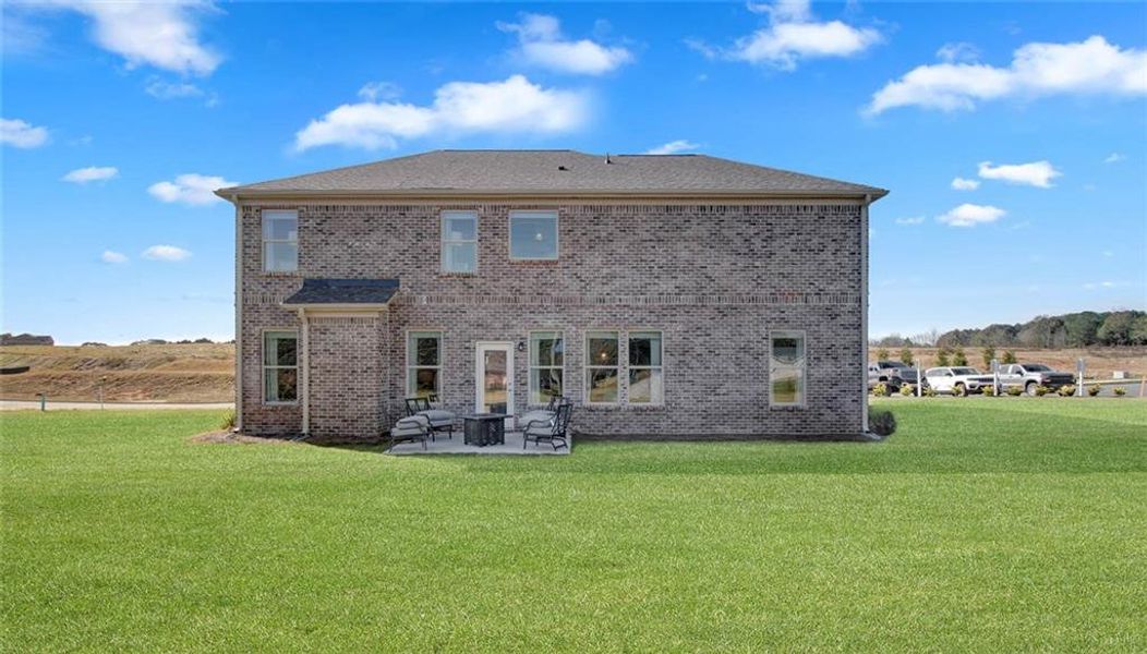 Front exterior of a new home in Adagio, Dacula, GA, highlighting curb appeal (Image 19).
