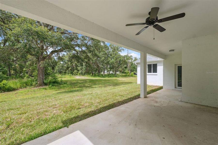 Exterior details and patio area of a home in , Brooksville (Image 31).