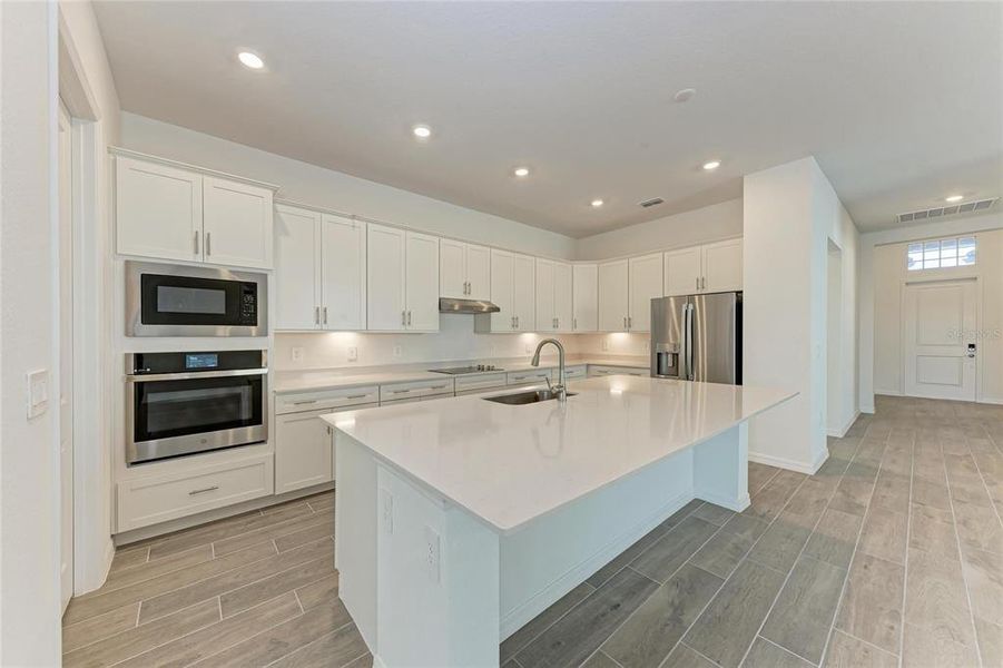 Furnished interior view inside a new home in Wellen Park Golf & Country Club: Executive Homes, Venice (Image 14).