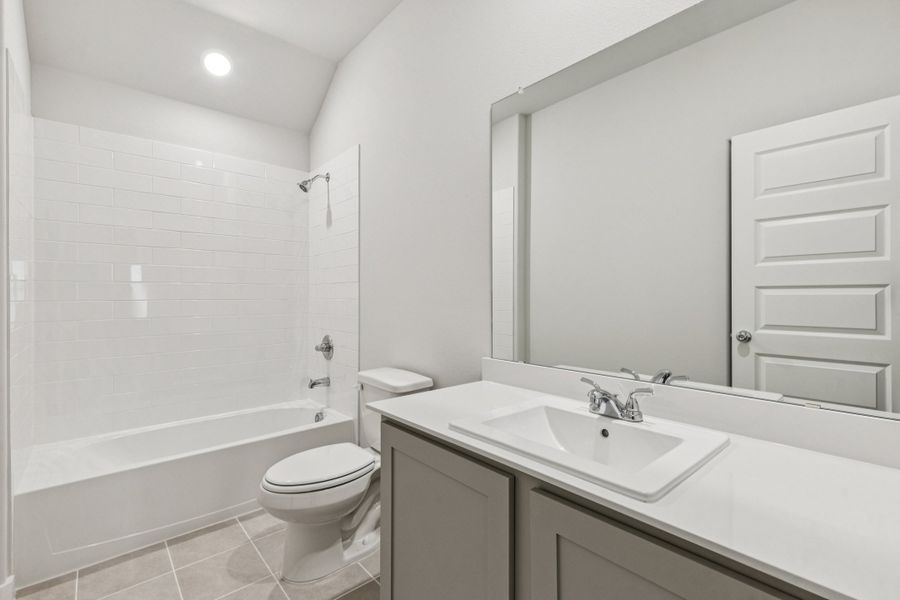 Bathroom in the Oscar home plan by Trophy Signature Homes – REPRESENTATIVE PHOTO Bathroom in the Oscar home plan by Trophy Signature Homes – REPRESENTATIVE PHOTO