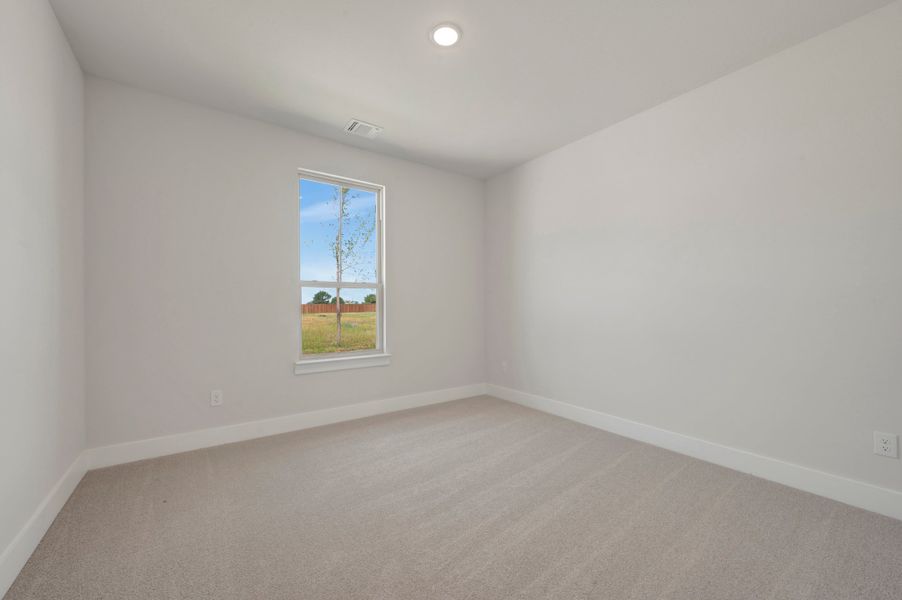 Spacious, unfurnished interior of a new home in The Meadows, Denton (Image 24).