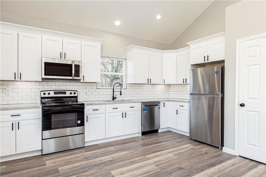 Furnished interior view inside a new home in , White (Image 4).