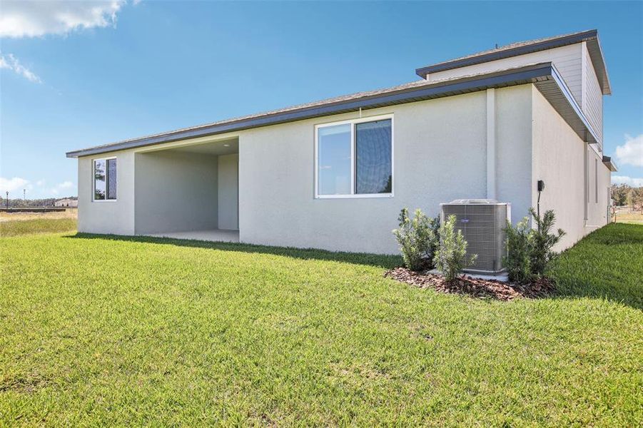 Exterior details and patio area of a home in Two Rivers - Signature Series, Zephyrhills (Image 25).