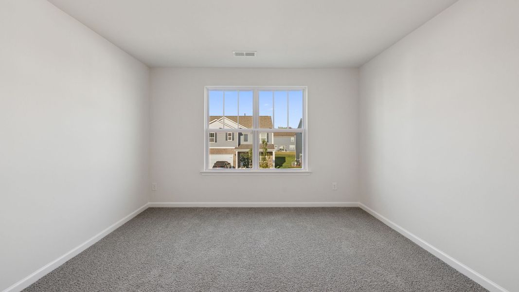 Spacious, unfurnished interior of a new home in Durbin Meadows Traditions, Fountain Inn (Image 22).