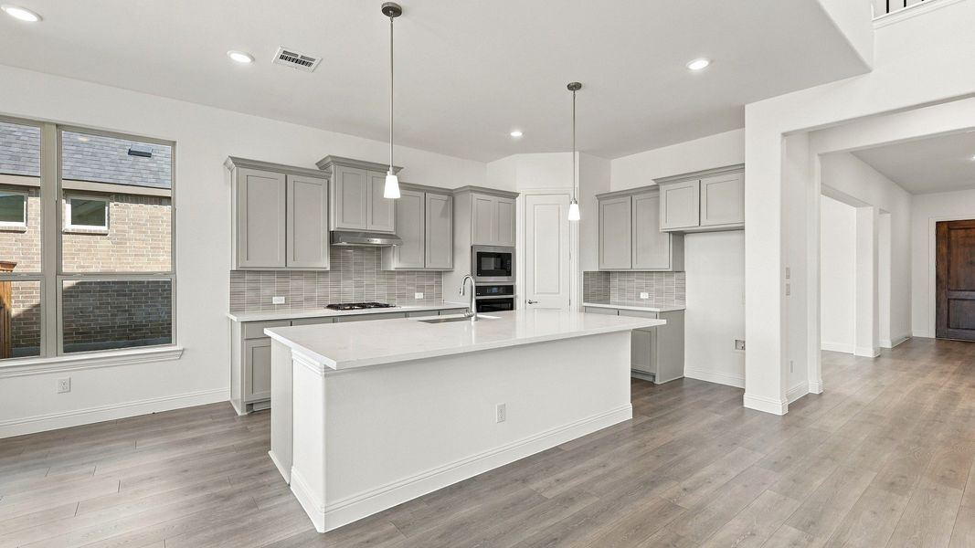 Furnished interior view inside a new home in Green Meadows Classic, Celina (Image 8).