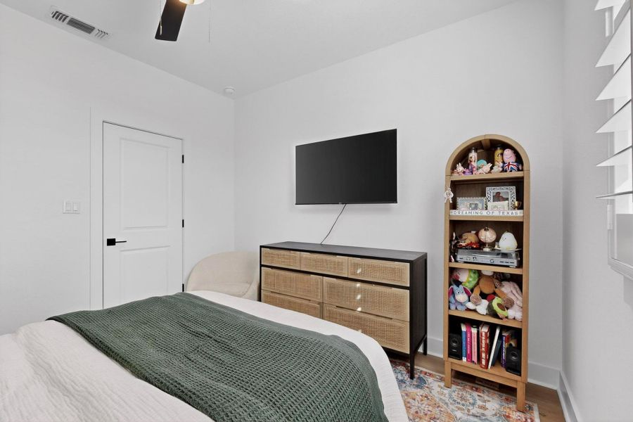 Bedroom #2 featuring a ceiling fan and wood finished floors