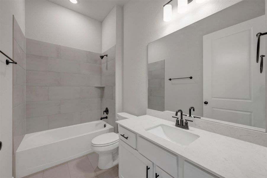 Furnished interior view inside a new home in Heritage, Dripping Springs (Image 6).
