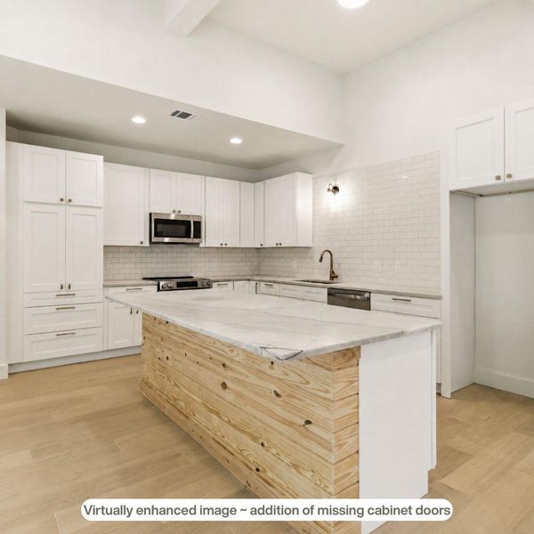 Cabinet doors were virtually staged to the far left - doors to be installed