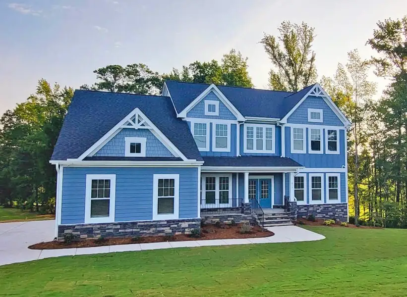 Representative exterior photo of a completed home built from the Lexington II by Caruso Homes in Sauls Landing, Zebulon, NC (Image 30). Representative exterior photo of a completed home built from the Lexington II by Caruso Homes in Sauls Landing, Zebulon, NC (Image 30).