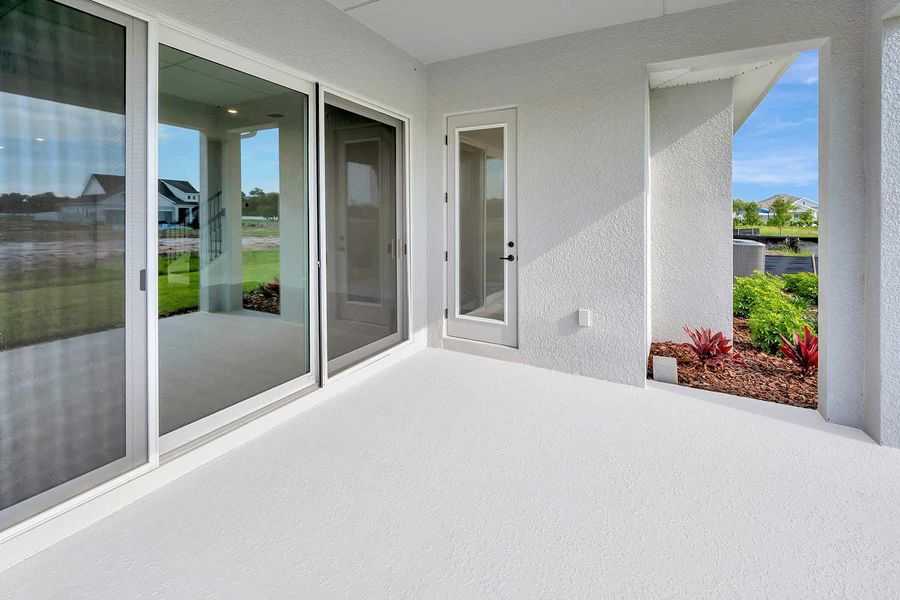 Representative exterior details of a home built from the The Hemphill by David Weekley Homes in Lakeview Crossing – Tradition Series, Sarasota (Image 3).
