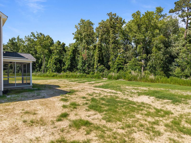 Front exterior of a new home in Laurel Oaks, Greenville, NC, highlighting curb appeal (Image 26). Front exterior of a new home in Laurel Oaks, Greenville, NC, highlighting curb appeal (Image 26).