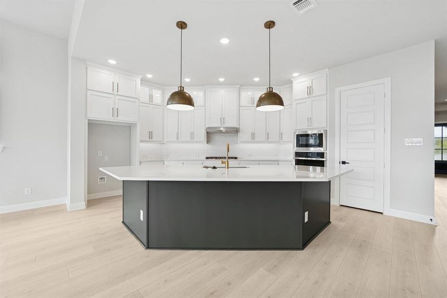 Furnished interior view inside a new home in Painted Tree - Classic Series, McKinney (Image 7). Furnished interior view inside a new home in Painted Tree - Classic Series, McKinney (Image 7).