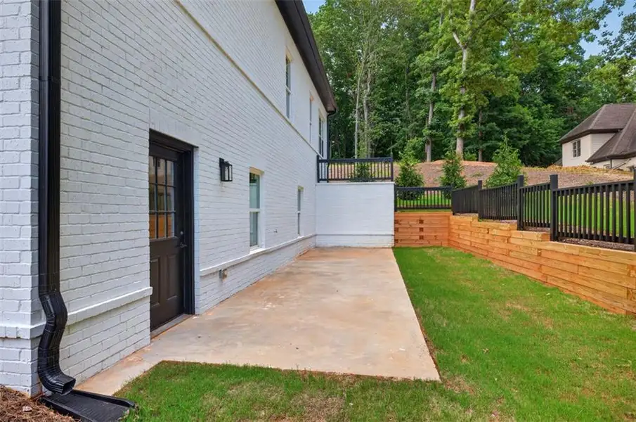 Exterior details and patio area of a home in , Hoschton (Image 26).