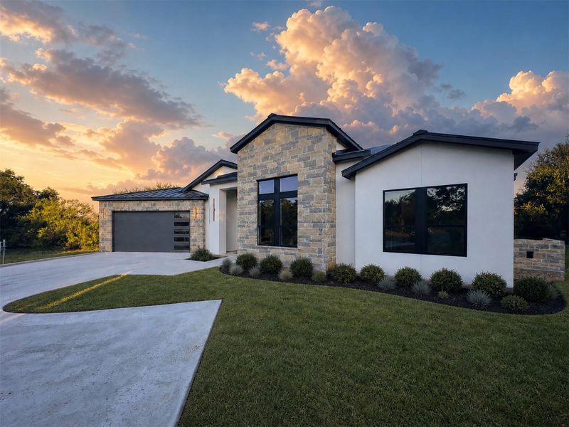 Clean lines and stone accents define this modern single-story residence under a dramatic sky. Clean lines and stone accents define this modern single-story residence under a dramatic sky.