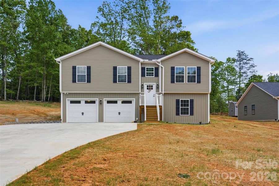 Front exterior of a new home in , Granite Falls, NC, highlighting curb appeal (Image 2).
