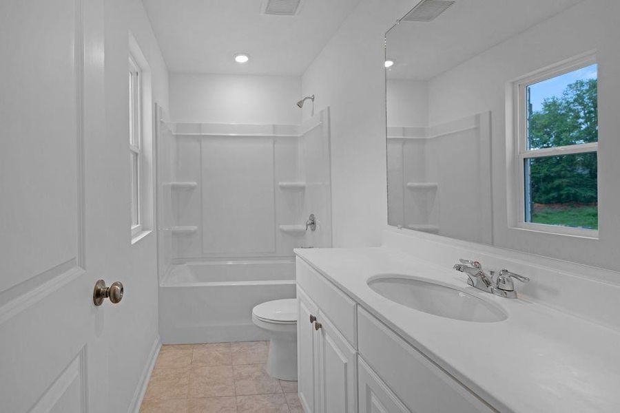 Furnished interior view inside a new home in Windance Lake, Loganville (Image 9).