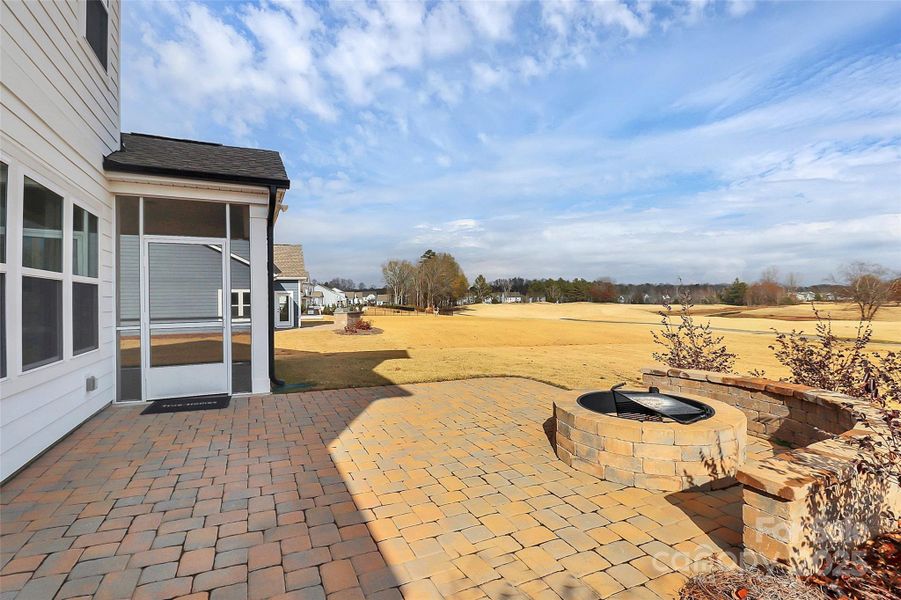Exterior details and patio area of a home in Stonebridge Fairways, Monroe (Image 4).