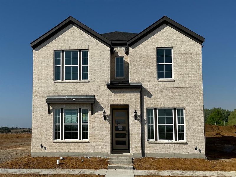 Front exterior of a home in the Manor 41s community, located in Frisco, TX (Image 1).