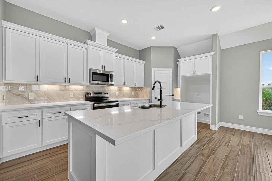 Furnished interior view inside a new home in , Prairie View (Image 12).