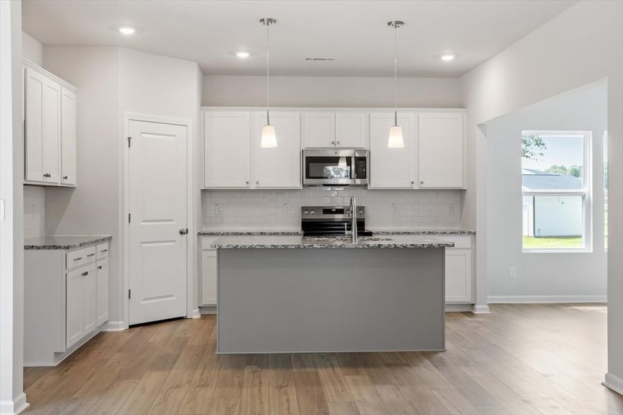Furnished interior view inside a new home in Cambridge Reserve, Angier (Image 9).