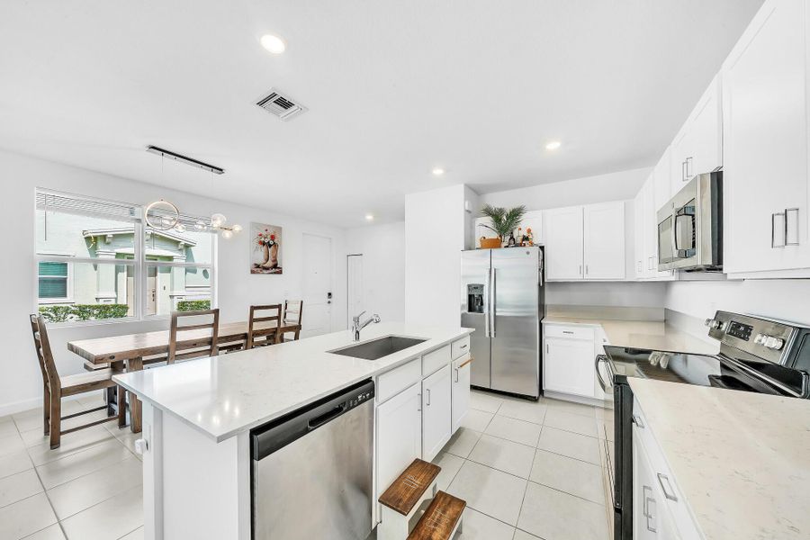 Furnished interior view inside a new home in , Port St. Lucie (Image 14).