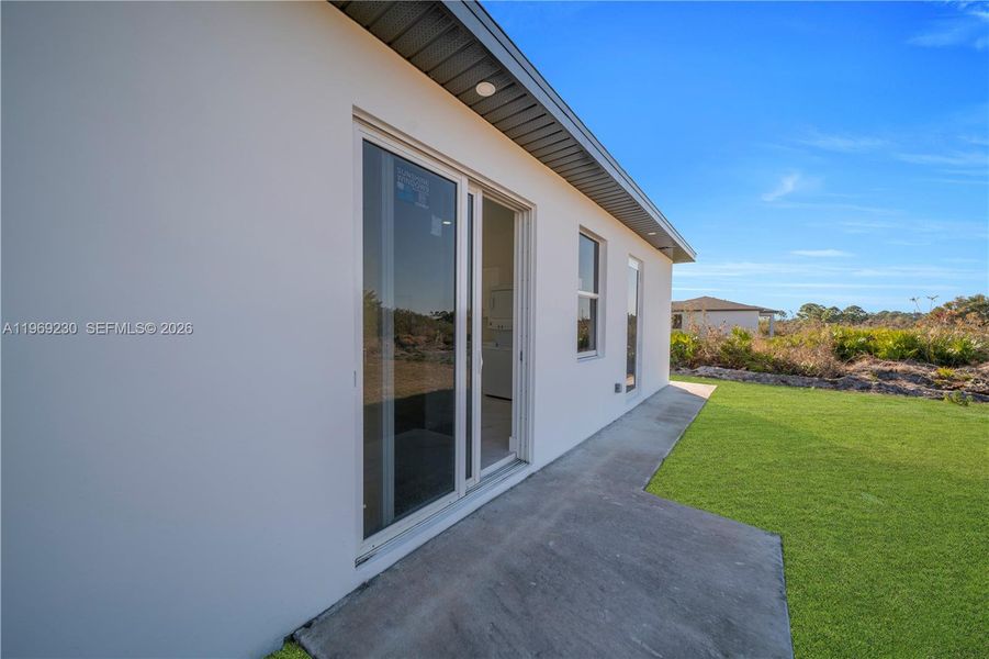 Exterior details and patio area of a home in , Lehigh Acres (Image 3).