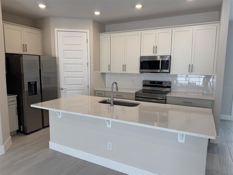 Furnished interior view inside a new home in , Kissimmee (Image 10).