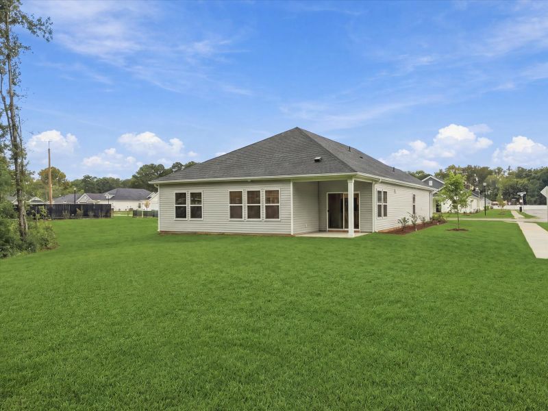 Exterior details and patio area of a home in Palmetto Place, Longs (Image 4).
