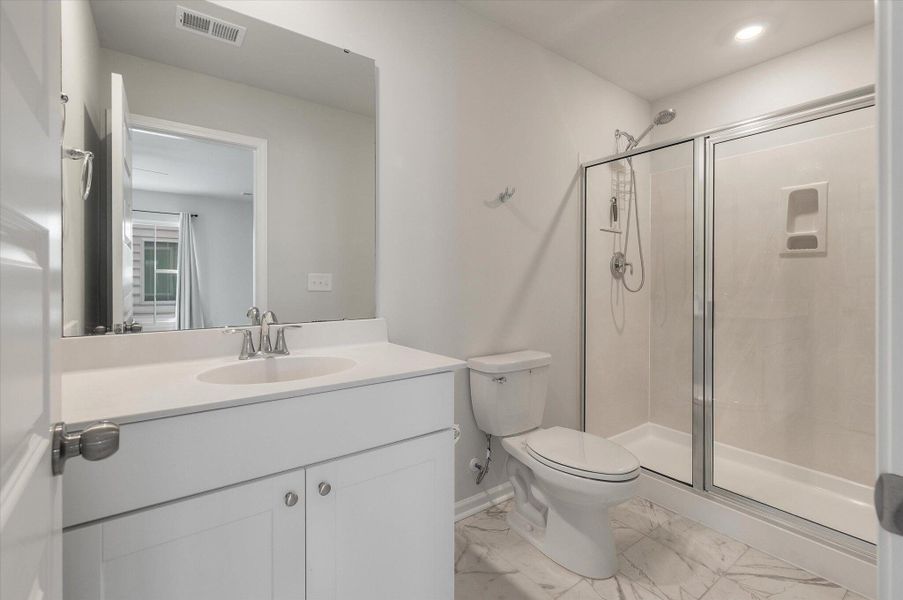 Furnished interior view inside a new home in Sweetgrass at Summers Corner, Summerville (Image 34).