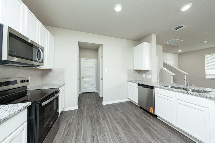 Furnished interior view inside a new home in Wayside Village, Houston (Image 3). Furnished interior view inside a new home in Wayside Village, Houston (Image 3).