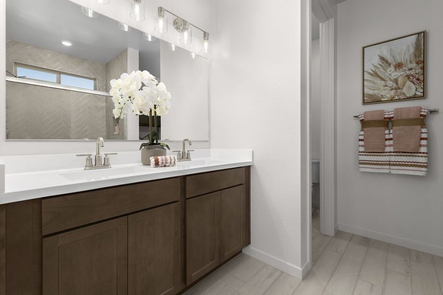 Dual-sink vanity at primary bath
