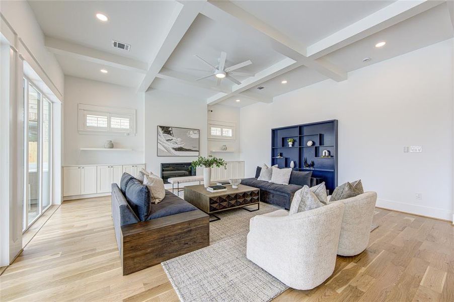 Texas-Size Living room with Coffered Ceiling and bunch of Built-ins. 8ft wide TV space for even the largest TV of tomorrow