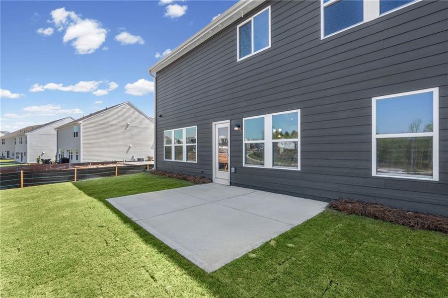 Exterior details and patio area of a home in Twin Lakes, Hoschton (Image 4).