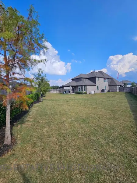 Exterior details and patio area of a home in Meridiana: 40ft. lots, Manvel (Image 18).
