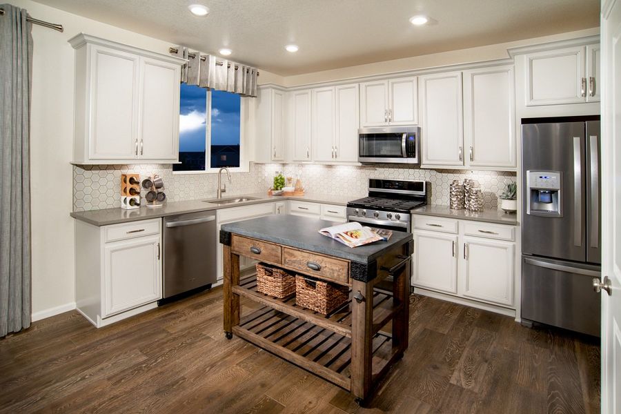 Furnished interior in a model home at Bennett Crossing Classic in Bennett (Image 5).