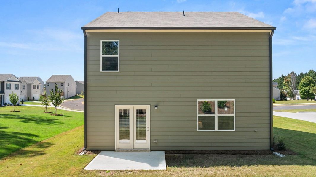 Representative exterior photo of a completed home built from the AISLE by D.R. Horton in Pointe Park, Union City, GA (Image 23).