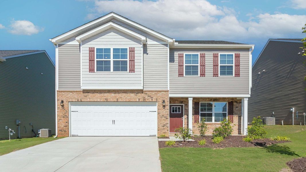 Front exterior of a new home in Bryson Park, Lexington, NC, highlighting curb appeal (Image 1). Front exterior of a new home in Bryson Park, Lexington, NC, highlighting curb appeal (Image 1).