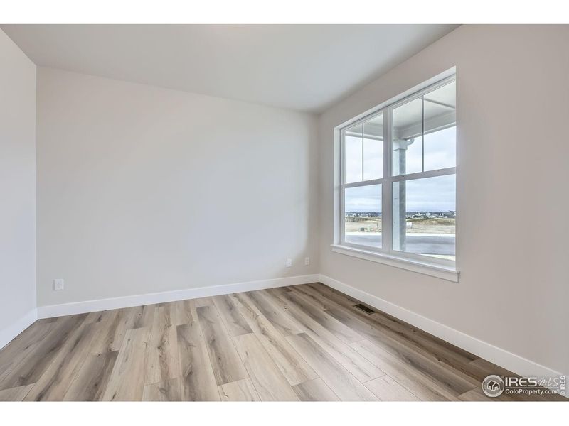 Spacious, unfurnished interior of a new home in RainDance, Windsor (Image 14).