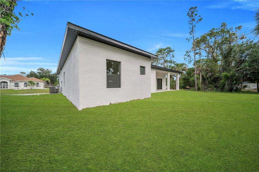 Exterior details and patio area of a home in , North Port (Image 23).