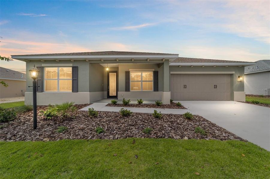 Front exterior of a new home in On Top of the World Communities, Ocala, FL, highlighting curb appeal (Image 19).